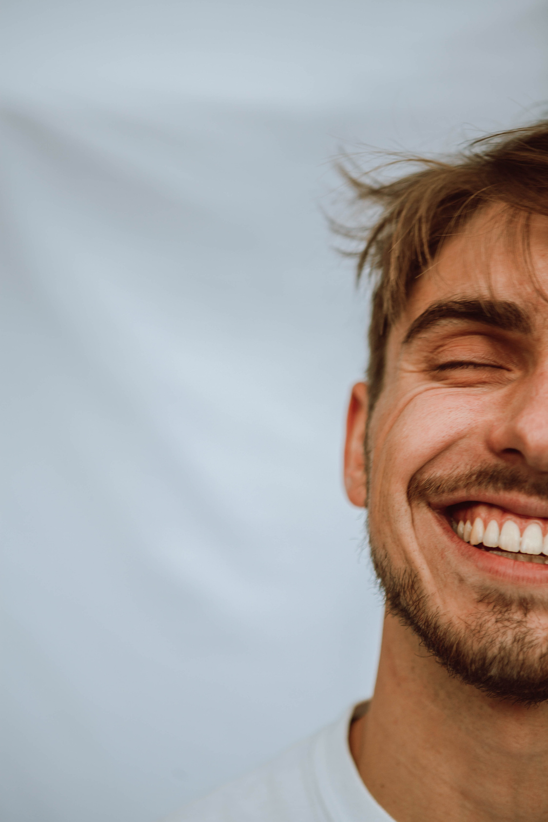 Half Face Portrait of a Happy Man 